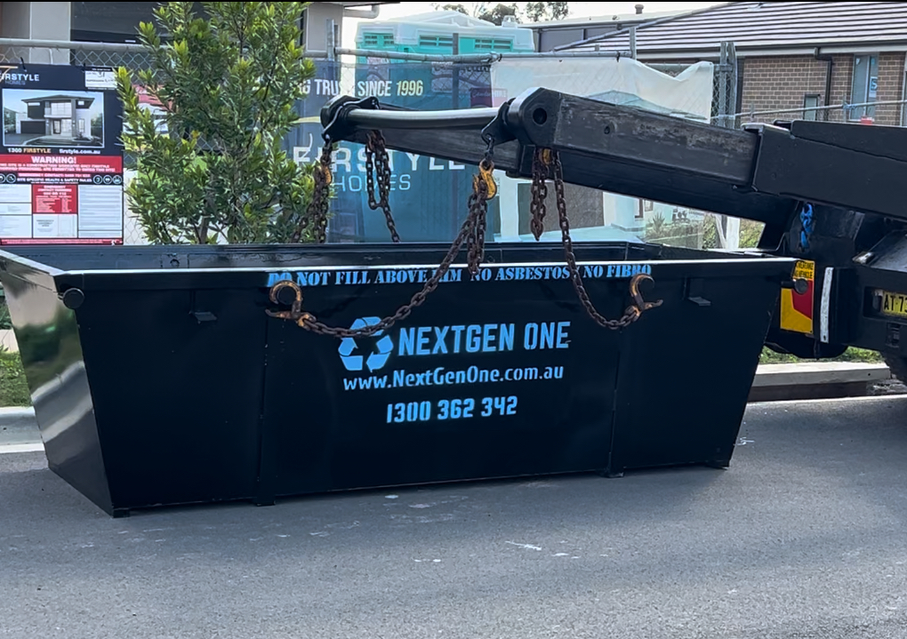 Image of skip bin with 'NextGen One' branding on the side of the bin.